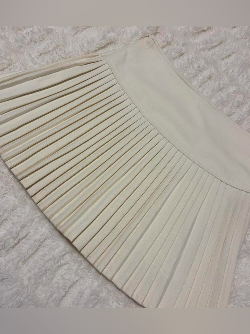 Pleated mini skirt
